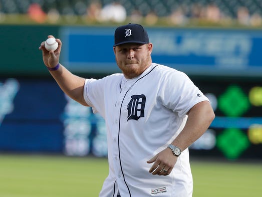 T.J. Lang throws out the first pitch at Comerica Park