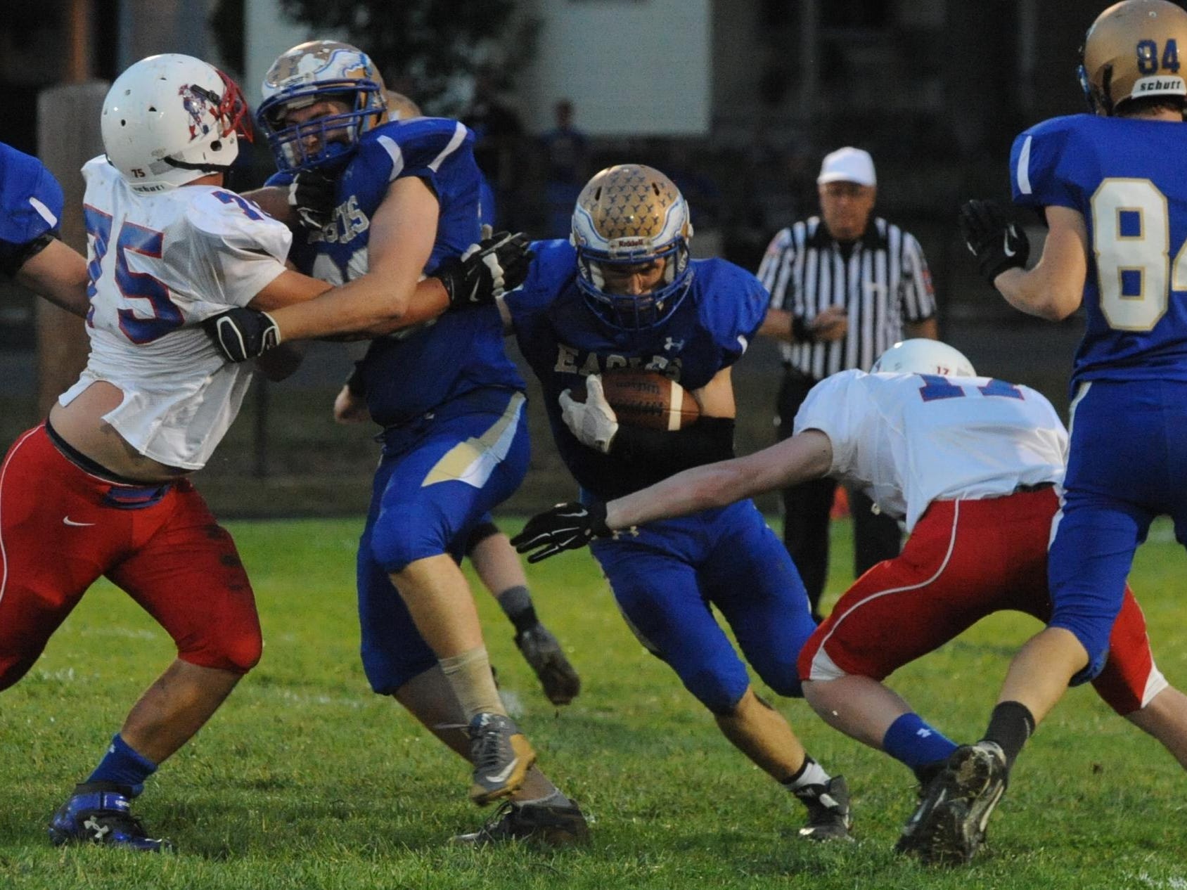 Lincoln’s Ben Bertsch looks for running room against Union County during Friday’s game in Cambridge City.
