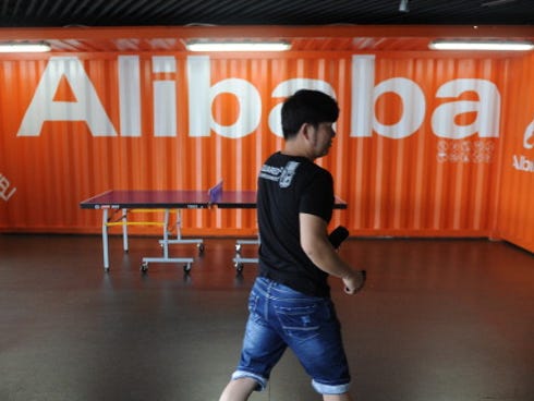 An Alibaba employee walks through a communal space at company headquarters in Hangzhou in 2012.