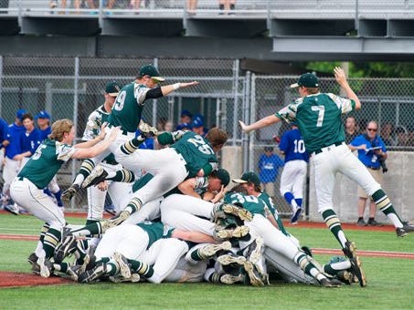 Ouachita Christian players celebrates a win over St. Edmund during the LHSAA Class 1A state baseballl championship game in Sulphur on Saturday.