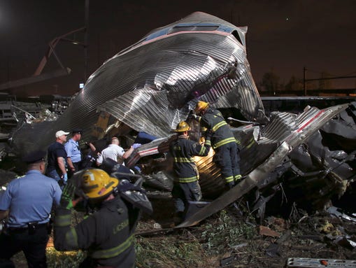 Emergency personnel work the scene of an accident,