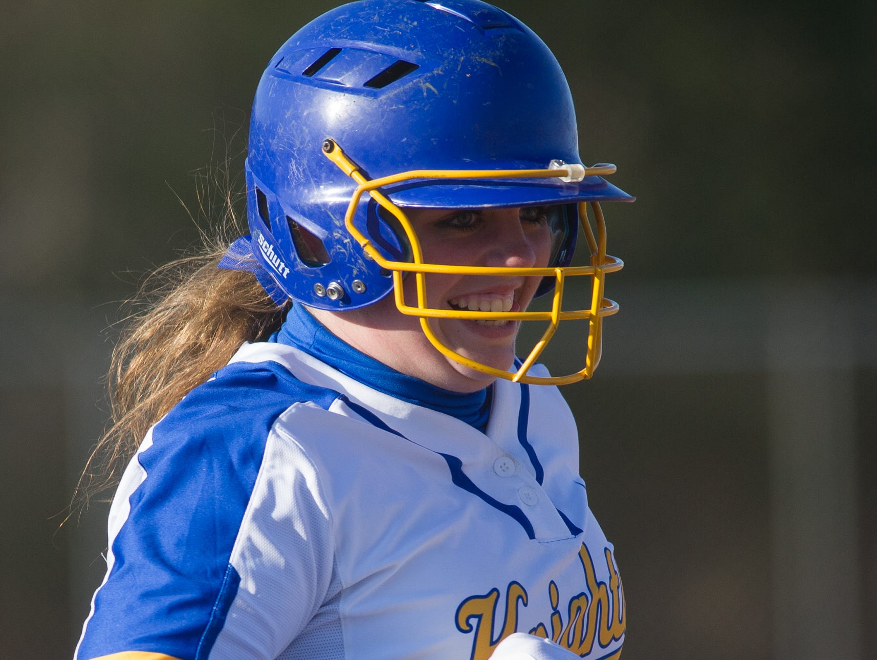 Sussex Central's Morgan Burton (13) is all smiles after scoring in the 5th inning against Sussex Tech.
