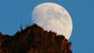 A spectacular moon rise at East Rosebud Lake near Alpine,