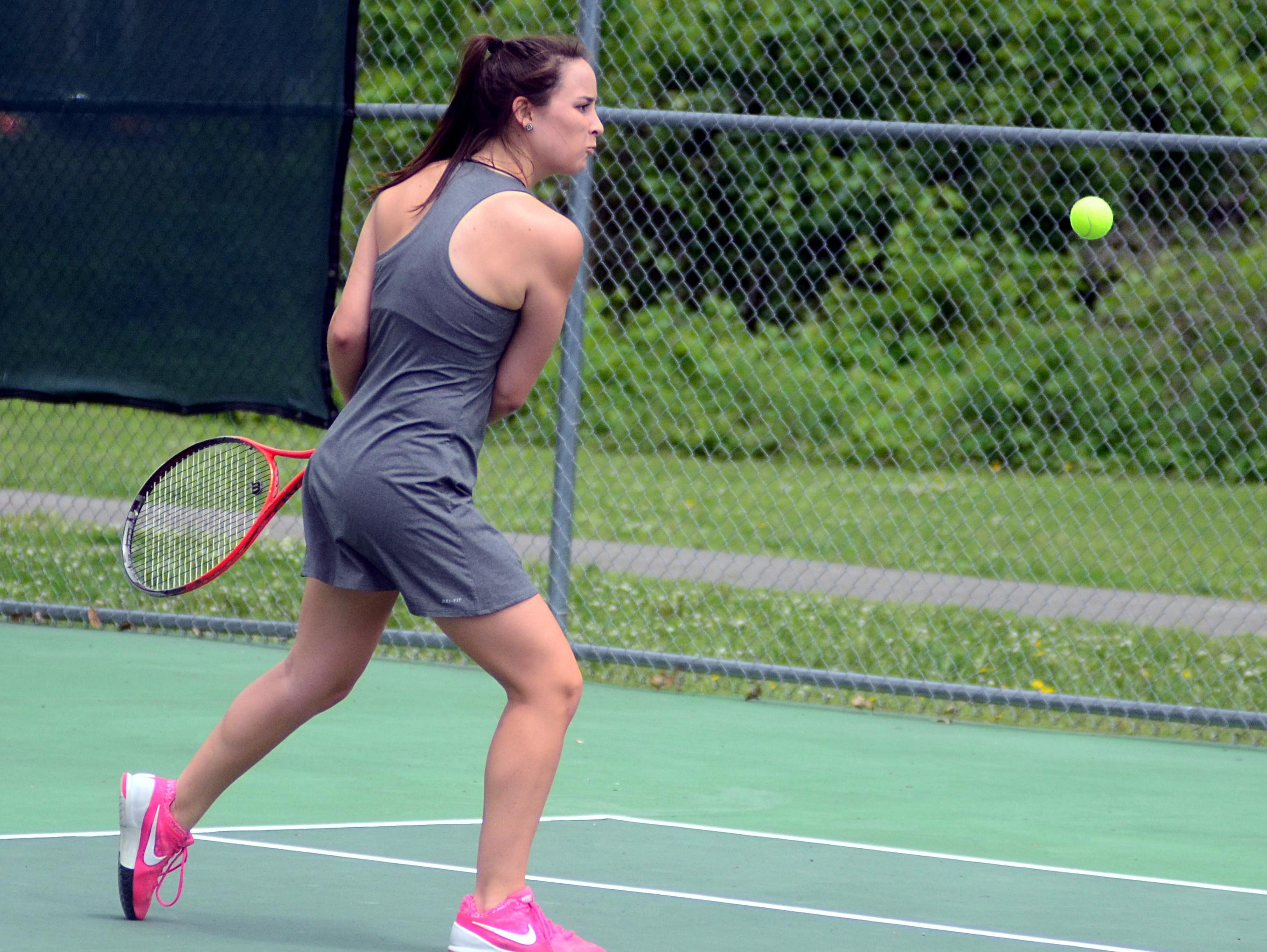 Hendersonville High sophomore Audrey Spurlock prepares to hit a backhand during Tuesday’s District 9-AAA Individual Tennis Tournament. Spurlock suffered a three-set loss in the first round.