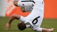 New Zealand's Chris Wood (9) tumbles early in the first