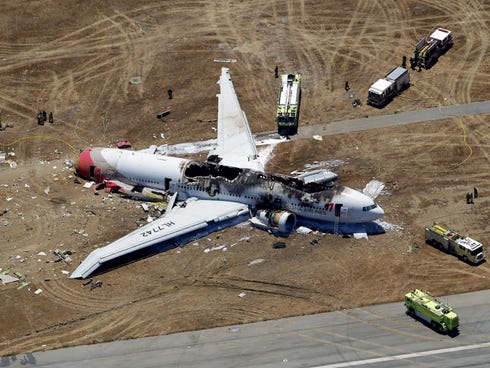 Asiana Flight 214 lies on the ground after it crashed at the San Francisco International Airport July 6.