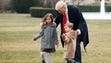 President Trump walks with his grandchildren Arabella