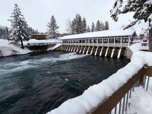 Water is seen flowing through the Lake Tahoe Dam and