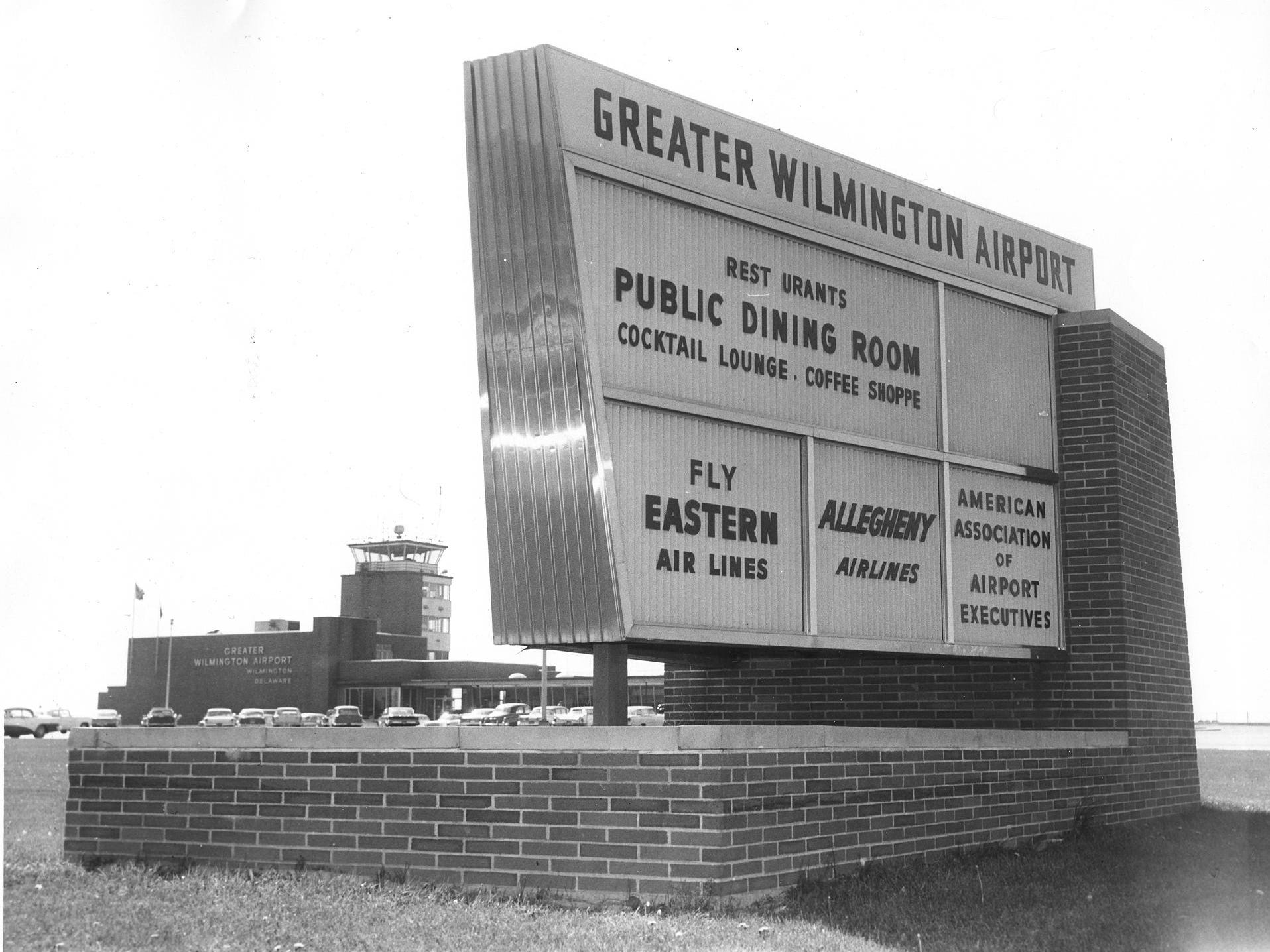 The sign at the main entrance of what was then called Greater Wilmington Airport is in May 1963.