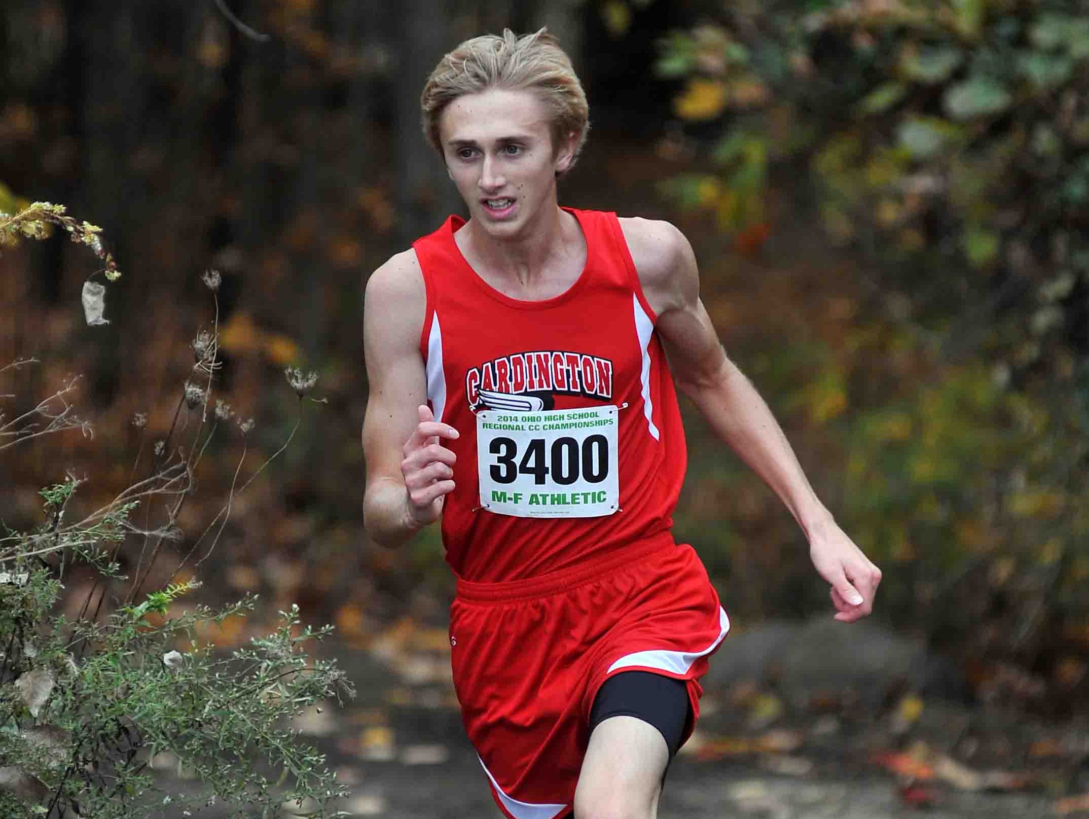Cardington's Jacob Long runs in the boys Division III regional cross country meet at Pickerington North High School in Pickerington. Long finished fourth in the race last year.
