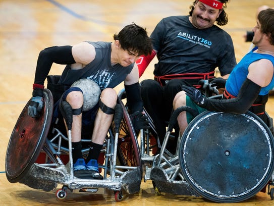 Jake Zunich (left) practices during an Ability360 Heat