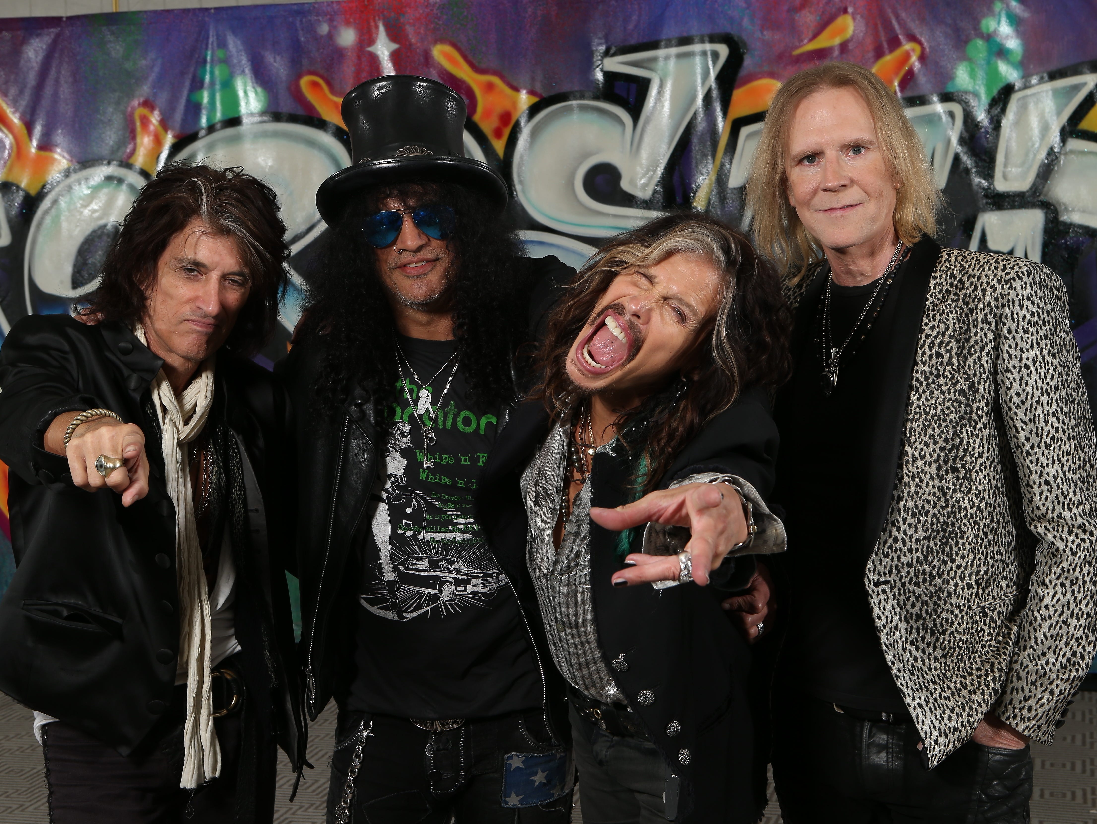 Aerosmith and Slash will join forces for a summer tour. Pictured from left: Joe Perry, Slash, Steven Tyler and Tom  Hamilton (Brad Whitford and Joey Kramer missed the Los Angeles press conference).