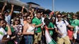 Mexican soccer fans cheer before the start of the game