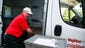 Hy-Vee Delivery driver Dan Pfaff loads and online order