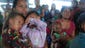 Families seek refuge inside a gymnasium in Cebu.