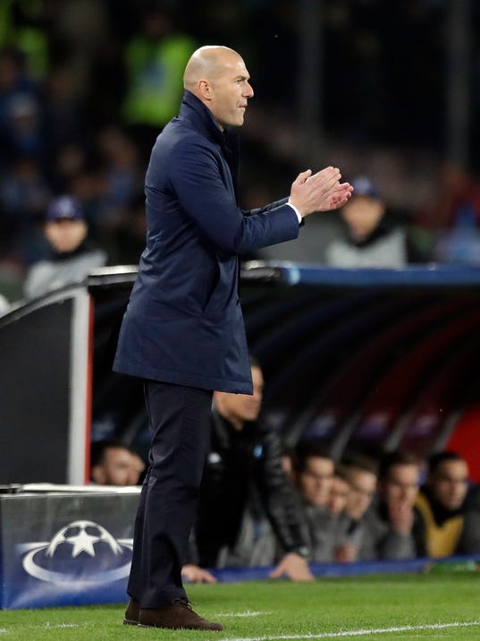 Real Madrid's head coach Zinedine Zidane applauds during the Champions League round of 16, second leg, soccer match between Napoli and Real Madrid at the San Paolo stadium in Naples, Italy, Tuesday March 7, 2017. (AP Photo/Andrew Medichini)