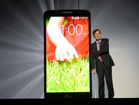 LG Communication CEO Park Jong-Seok unveils LG's new smartphone the LG G2 during a global launch event in New York, Aug. 7.