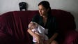 Juliana da Silva, sits with her daughter Maria in Alcantil,