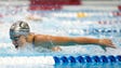 Dana Vollmer races during the women's 100 butterfly