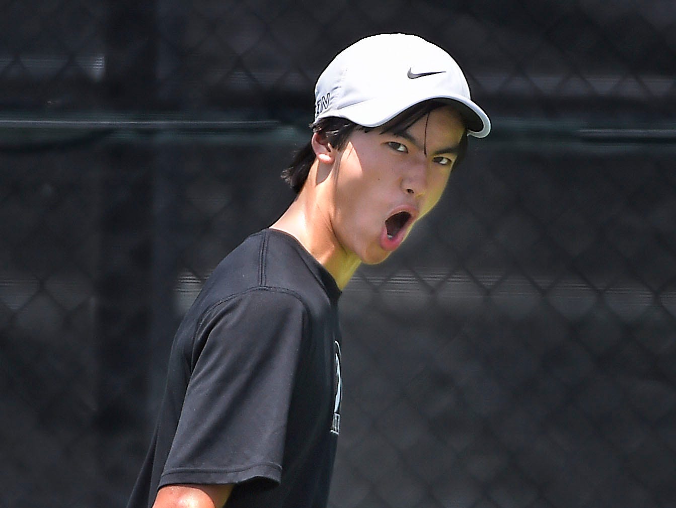 Central Magnet's Nathan Zou shouts as he scores against MTCS's Will Reeves in the 2016 TSSAA State tennis tournament Thursday May 26, 2016, in Murfreesboro, TN