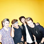 5 SECONDS OF SUMMER | They may look like a carbon-copy of One Direction (with slightly more piercings), but the members of pop-punk quartet 5 Seconds of Summer are determined to step out of the shadow of their tourmates. "We didn't really realize we were a boy band
until people started calling us a boy band," drummer Ashton Irwin told USA TODAY.
"I understand and we don't care what people call us, as long as we're
making the music we love.'