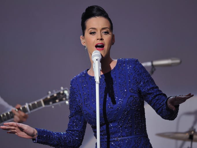 Singer Katy Perry performs at a concert in celebration of the Special Olympics on July 31, 2014 in the East Room of the White House in Washington, DC. AFP PHOTO/Mandel NGAN        (Photo credit should read MANDEL NGAN/AFP/Getty Images)