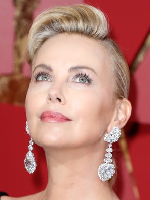 Charlize Theron was dripping in Chopard jewels.The