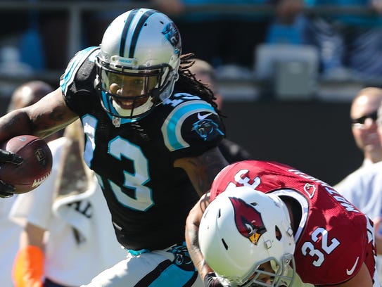 Carolina Panthers wide receiver Kelvin Benjamin tries