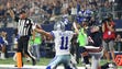 Cowboys receiver Cole Beasley (11) looks for the touchdown