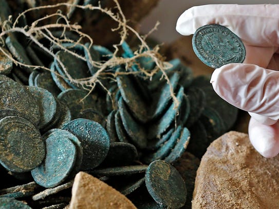 1,300#'s of Roman Coins Discovered In Spain  635975272665018193-EPA-SPAIN-ARCHEOLOGY