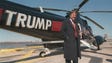 Donald Trump stands next to one of his three Sikorsky