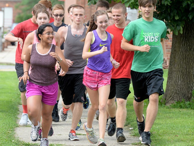 Richmond High School cross country runners practice Friday, Aug. 14 ...