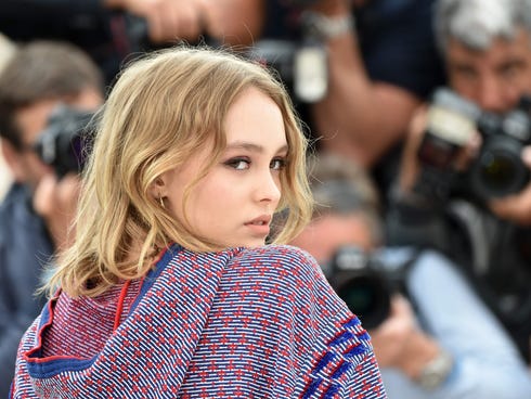Lily-Rose Depp poses during her photocall in Cannes.