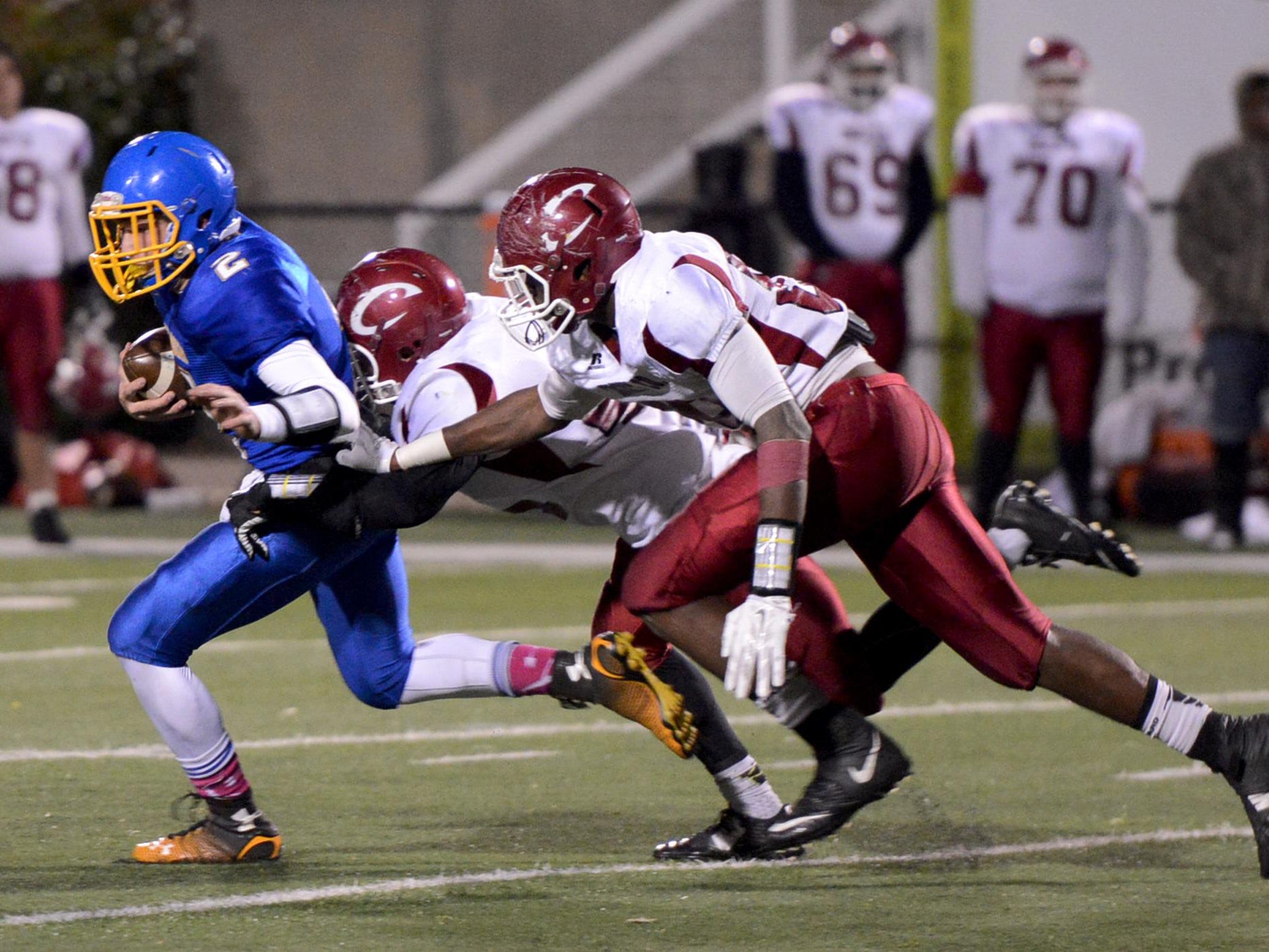 Westview quarterback Dallas Callins tries to avoid a couple of pass rushers from Crockett County during their game last season.