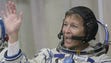 Astronaut Peggy Whitson waves during a farewell ceremony