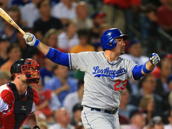 Game 1: Dodgers slugger Adrian Gonzalez watches his two-run homer leave the yard during the third inning.