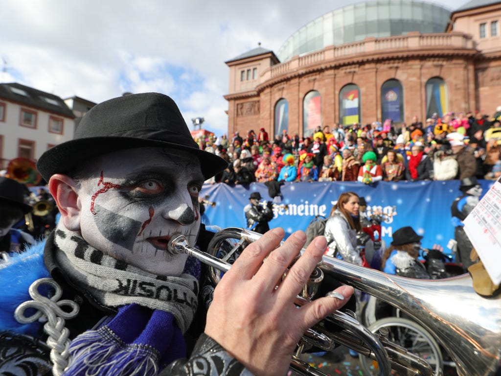 A Guggemusik band marches during the Rose Monday carnival parade in Mainz, Germany. Mainz is one of the carnival strongholds in Germany with its Rose Monday parade jokingly criticizing political and social developments. Rose Monday is the traditional