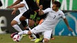 New Zealand's Kosta Barbarouses (7) battles for the