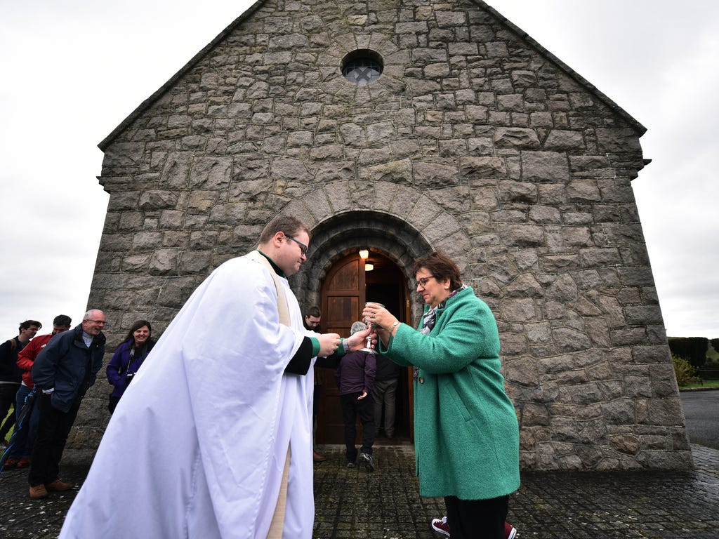 Communion is served as a service and pilgrimage to celebrate St. Patrick takes place at Saul Church in Downpatrick, Northern Ireland. Saul church is known as the Cradle of Christianity in Ireland and was built in 1788 to mark the anniversary of Patri