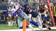 Cowboys tight end Jason Witten (82) reaches for the