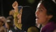Mehreen Chaudhary chants during a protest in opposition