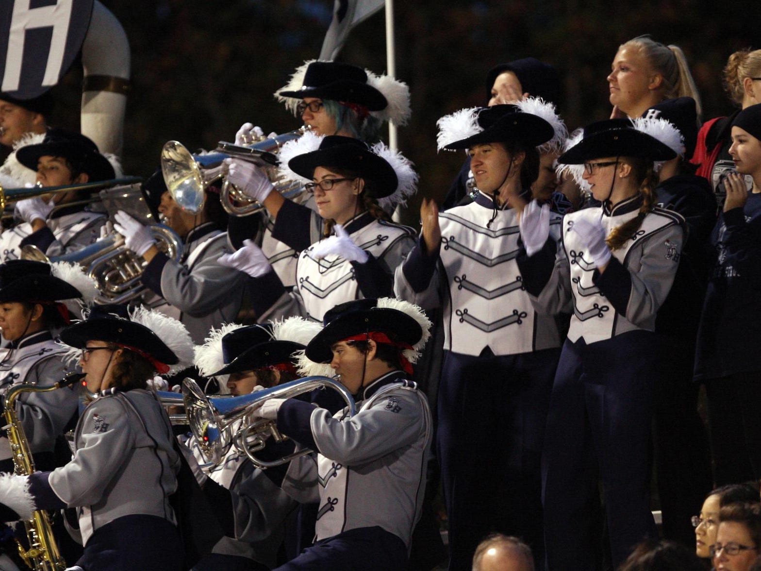 The Howell band plays as their team plays Freehold Township in a football game Friday, September 25, 2015, at Howell High School.