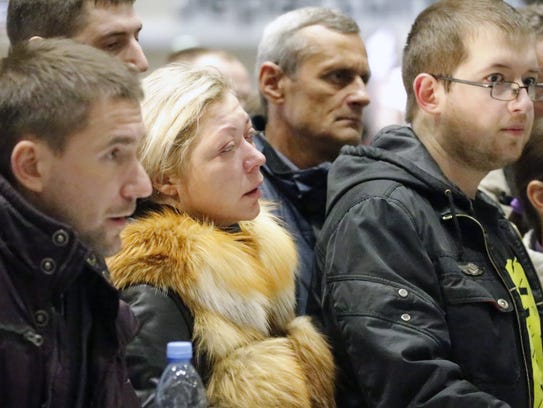 Relatives of passengers of MetroJet Airbus A321 wait