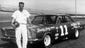 Ned Jarrett, posing with his 1965 Ford, won two championships