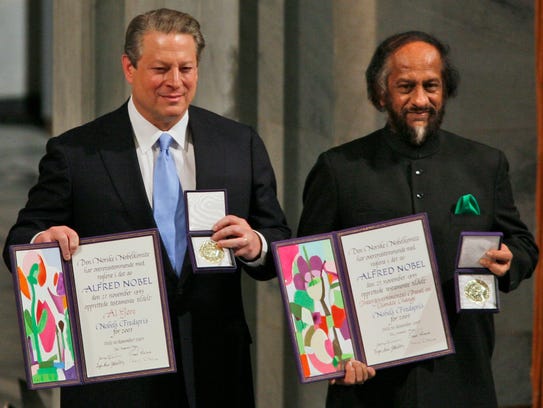 Nobel Peace Prize winners Al Gore, left, and Rajendra