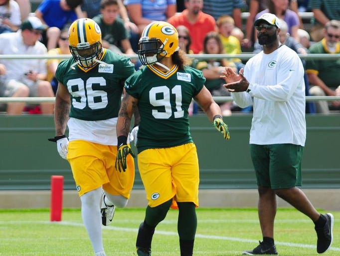Green Bay Packers linebackers Mike Neal (96) and Carl Bradford during OTA practice at Ray Nitschke Field, Tuesday, June 10, 2014.