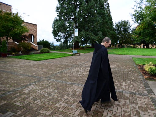 
Brother Andre Love, a Benedictine monk, walks to the