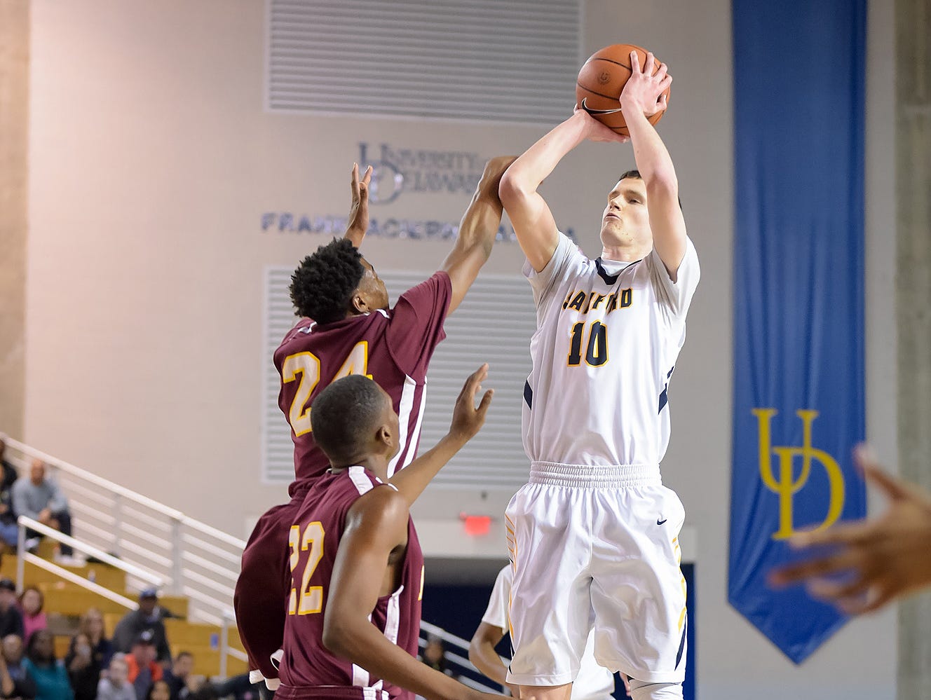 Sanford's Jacob Walsh shoots a jump shot at the Bob Carpenter Center on Sunday in the DIAA quarterfinals.