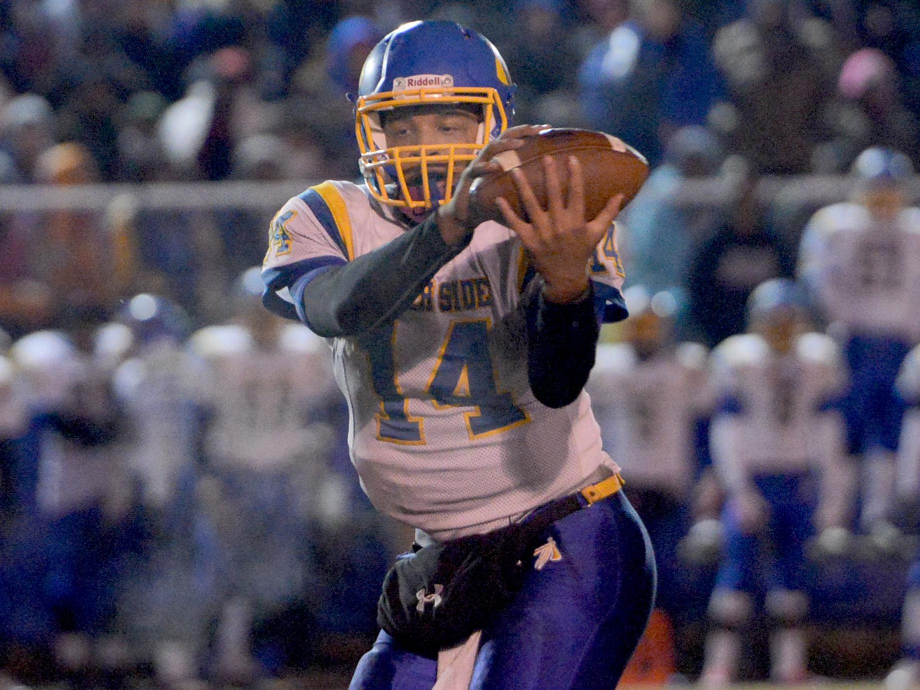 North Side's Tyalen Shaw takes a snap during a game last year. The Indians won’t play one of their biggest rivals from South Side this year other than during the SportsPlus Jamboree.