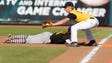 Clear Lake's Brad Burns attempts a tag out at first
